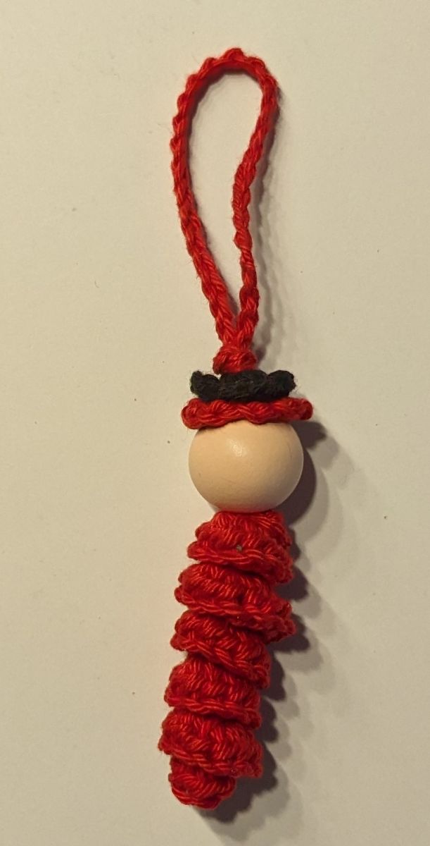 Blog-Inhaltsbild für 'Kostenlose Anleitung Glückswürmchen Sorgenwürmchen Clown mit Haaren und Hut'